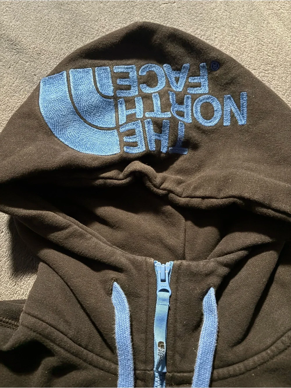 The North Face Black Hoodie with Light Blue Trim